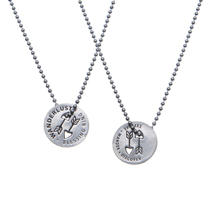 Wanderlust Blessing Rings on a necklace