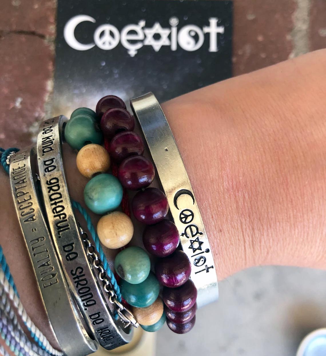 Wearing Coexist Quotable Cuff Bracelet