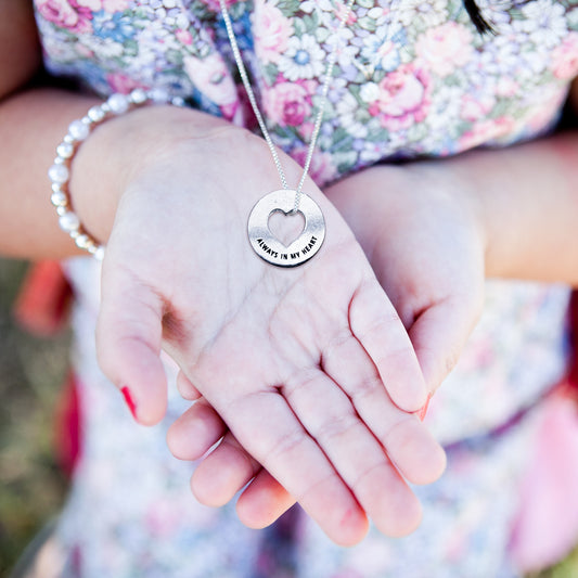 mom holding blessing ring