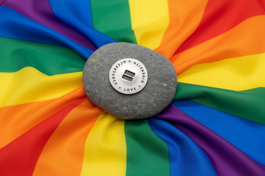 Unity Equality Diversity meditation stone on pride flag