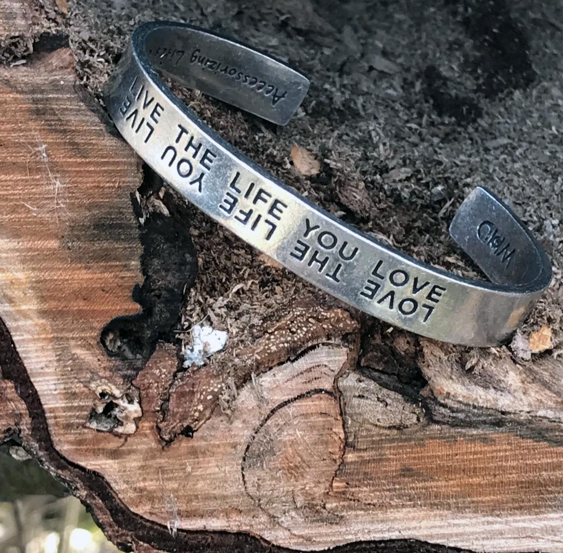 Live the Life You Love Quotable Cuff Bracelet on wood