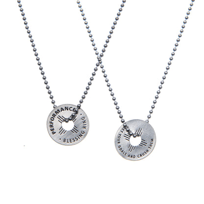 Performance Blessing Rings on a necklace