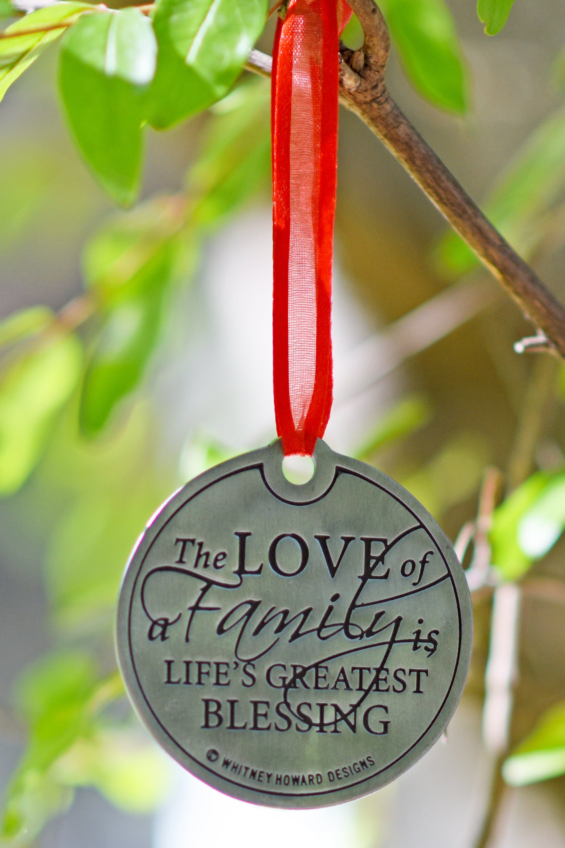 The Love of a Family is Life's Greatest Blessing Holiday Ornament hanging