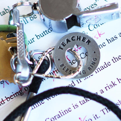 Teacher Blessing Ring on keyring on school paper